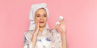 woman using skincare on her face