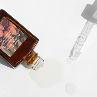 open bottle of Dr. Althea Vitamin C Boosting Serum with dropper