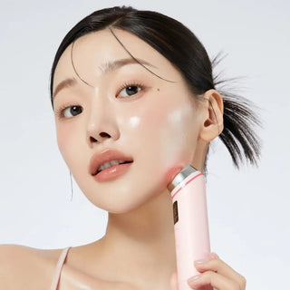 korean woman using AGE-R Booster Pro Pink on her face