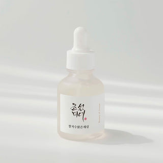dropper bottle of Glow Deep Rice + Alpha-Arbutin Serum