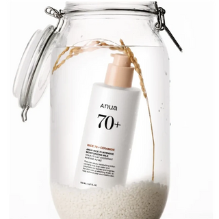 ANUA Rice 70 Intensive Moisturizing Milk bottle in water-filled jar