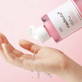 medicube PDRN Pink Cica Soothing Toner dispensed out on hand