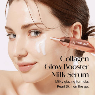 woman applying Medicube collagen Glow Booster Milk Serum on her cheeks