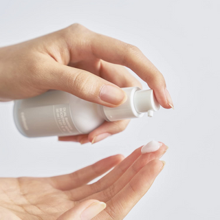 celimax Dual Barrier Skin Boosting Serum 30mL pumped out on a finger