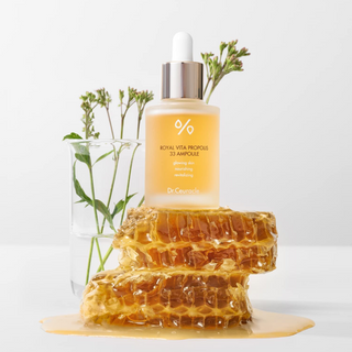 Dr.Ceuracle Royal Vita Propolis 33 Ampoule standing on honeycomb