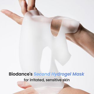 a hand carrying BIODANCE Hydrogel Mask