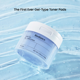 BIODANCE Cera-nol Gel Toner Pads (60 Pads/140g) container placed on a gel surface
