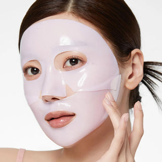 woman wearing medicube PDRN Pink Collagen Gel Mask on her face