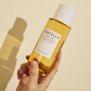 a hand holding SKIN1004 Madagascar Centella Toning Toner