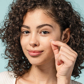 COSRX Acne Pimple Patch 1 Pack (24 Patches) Applying on face of a girl