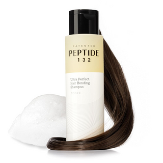 COSRX PEPTIDE 132 Hair Bonding Shampoo with a brown hair strand