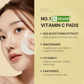 woman applying medicube Deep Vita C Facial Pads on her face