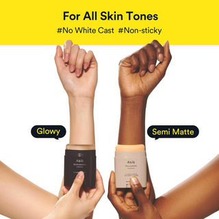 two hands with different skin tones holding Abib Airy Sunstick Smoothing Bars