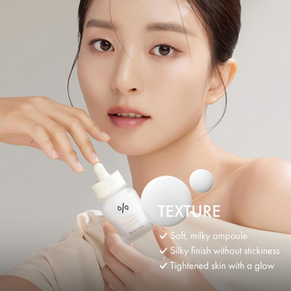 woman holding Dr.Ceuracle Vegan Niacin & Rice Ampoule 30mL bottle