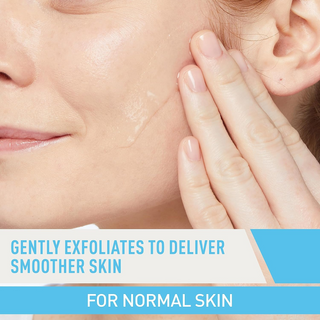 close-up of a woman applying CeraVe Renewing Salicylic Acid Cleanser on her cheek