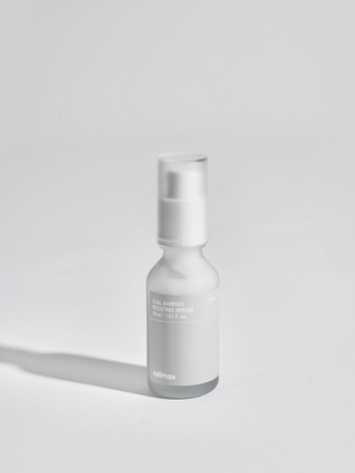 celimax Dual Barrier Skin Boosting Serum 30mL bottle on a surface