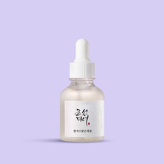 a bottle of Glow Deep Serum: Rice + Alpha-Arbutin