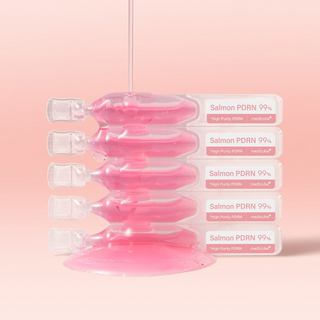 medicube PDRN Pink One Day Serums drenched in product