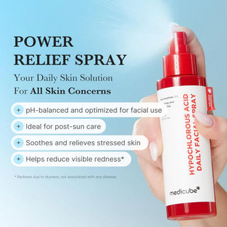 hand holding Medicube Hypochlorous Acid daily facial spray bottle