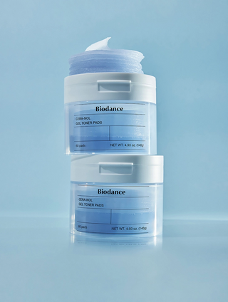 BIODANCE Cera-nol Gel Toner Pads (60 Pads/140g) placed above two toner pad containers