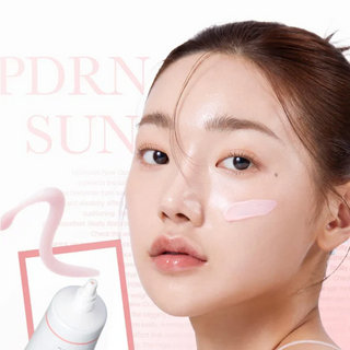 woman with medicube PDRN Pink Tone Up Sun Cream on her cheek