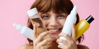 girl holding skincare products