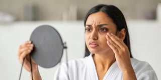woman looking in the mirror