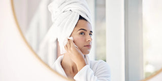 woman looking in the mirror