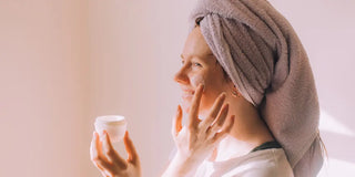 woman applying skincare