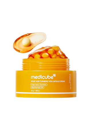 the organce color capsule Is medicube kojic acid turmeric vita capsule cream with niacinamide 5% incuded in the orange cream.