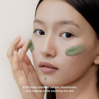 woman applying Arencia Green Tea + LHA Deep Pore Rice Cake Cleanser on her face